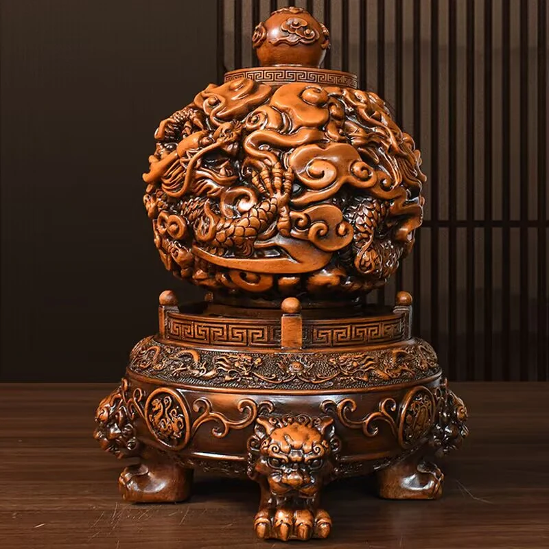 Front view of the Feng Shui ball, featuring intricate dragon carvings and a decorative base.