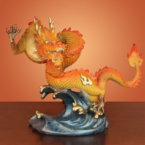 Front view of the golden Chinese dragon statue, emphasizing its vibrant colors and dynamic pose.